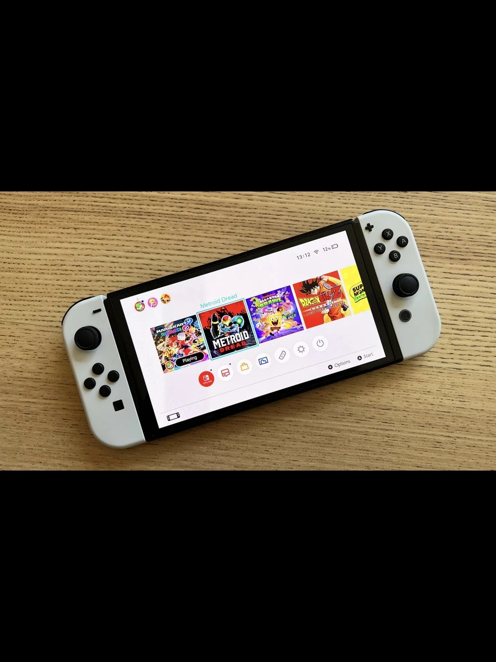 Nintendo Switch OLED Console with White Controllers